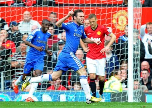 Juan Mata celebrates his winning goal at Old Trafford yesterday. Picture: PA