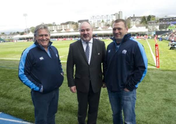 Scott Johnson, left, with Mark Dodson, centre, and Jonathan Humphreys at Scotstoun yesterday. Picture: SNS