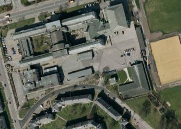The man was found in the grounds of St Machar Academy. Picture: Google