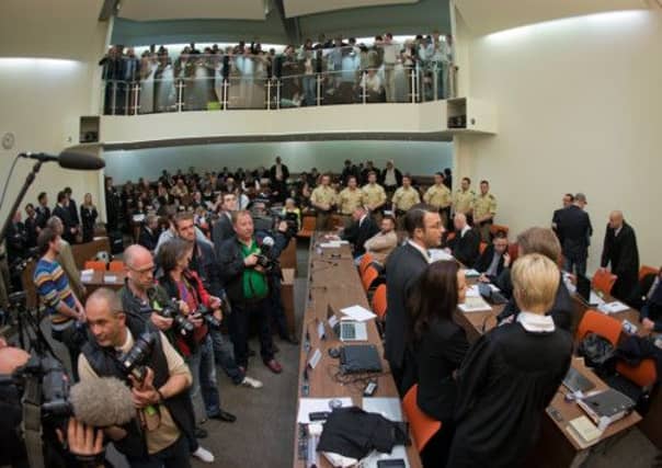 Beate Zschaepe stands in court with her legal team. Picture: AFP/ Getty