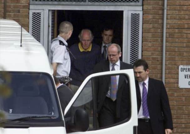 Great Train Robber Ronnie Biggs arrives back in Britain from Brazil in 2001 after spending more than 30 years on the run