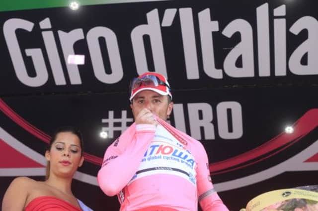 Luca Paolini celebrates on the podium after winning the third stage of Giro dItalia going from Sorrento to Marina di Ascea. Picture: Getty