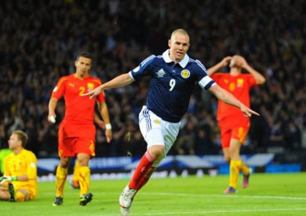 Kenny Miller celebrates a goal for Scotland. Miller is among the top earners in the MLS. Picture: Robert Perry