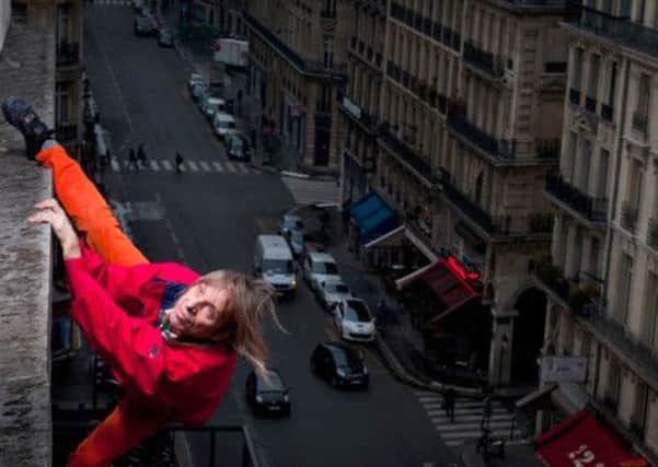 Polly Morland meets the French Spiderman Alain Robert in a chapter titled Gravity. Photographs: Getty Images