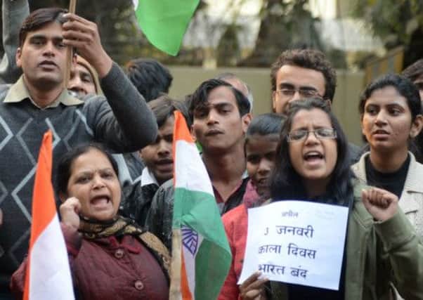 Indian protestors shout anti-government slogans as they protest against the gangrape. Picture: Getty
