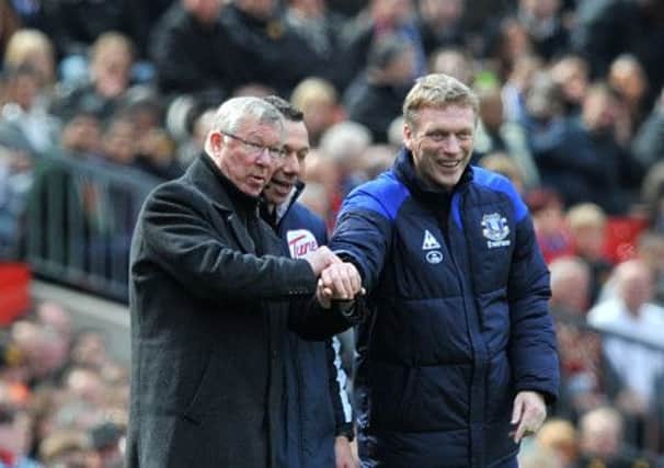 Sir Alex Ferguson and David Moyes. Picture: PA