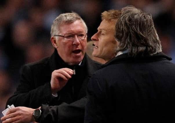 Alex Ferguson takes on Manchester City manager Roberto Mancini. Picture: Getty