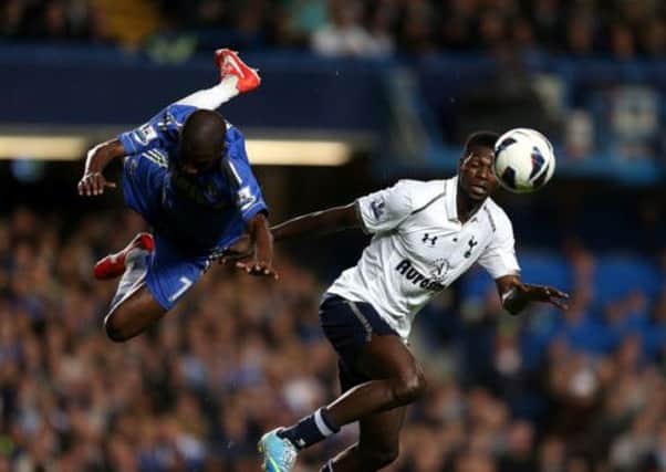 Emmanuel Adebayor and Ramires battle for the ball. Picture: PA