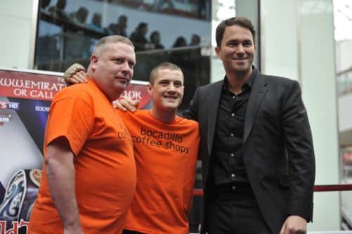 Ricky Burns, centre, with trainer Billy Nelson, left, and promoter Eddie Hearn. Picture: Robert Perry