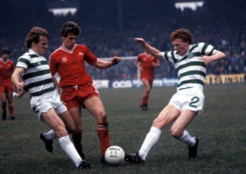 Celtics David Moyes, right, and Murdo MacLeod, left, put Eric Black of Aberdeen under pressure. Picture: SNS