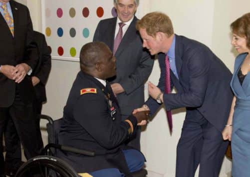 The Prince with Colonel Gregg Gadson. Picture: PA