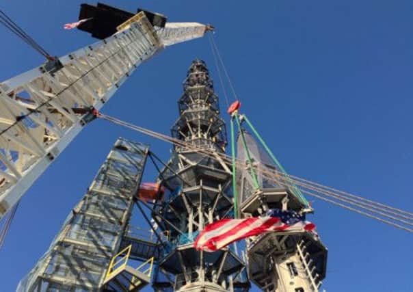 The silver spire has been installed on the 1 World Trade Center building in New York. Picture: AP