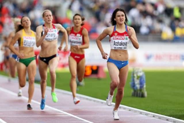 Yelena Arzhakova denied Lynsey Sharp, left, European gold in Helskinki but has since failed a drugs test. Picture: Getty