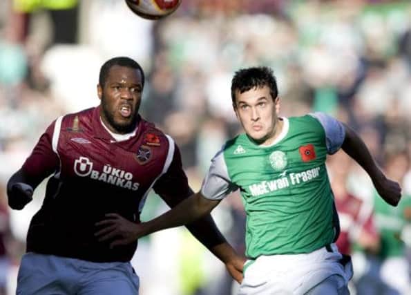 Ian Murray, who has always enjoyed Edinburgh derbies, tussles with Christian Nade in a 2009 clash. Picture: Jane Barlow