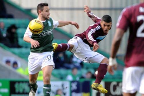 Hibs Tom Taiwo and Callum Tapping of Hearts fight for possession during the most recent Edinburgh derby. Picture: Jane Barlow