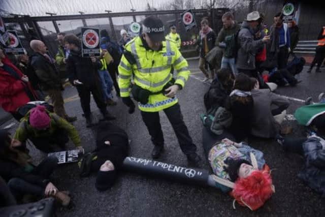 Activists protest at Faslane naval base over Trident, which is another question in the independence debate. Picture: PA