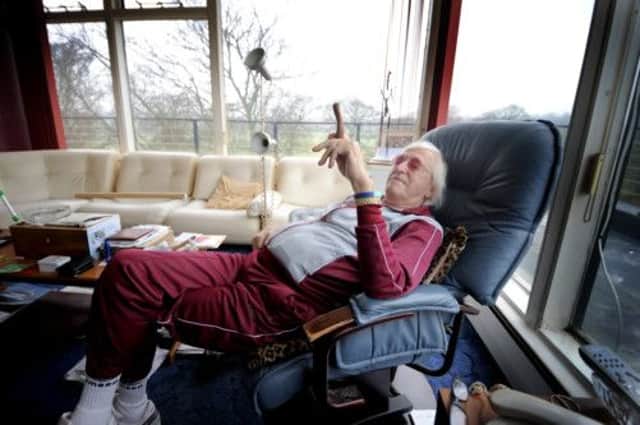 Jimmy Savile at his home in Leeds. Picture: James Hardisty