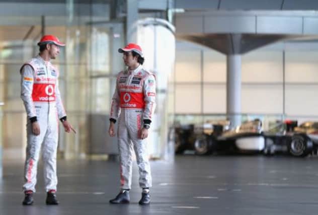 Jenson Button and Sergio Perez clashed on the track in Bahrain. Picture: Getty