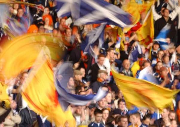 Poll: Scottish football fans would support a pilot scheme for the reintroduction of alcohol in stadiums on match days. Picture: Neil Hanna