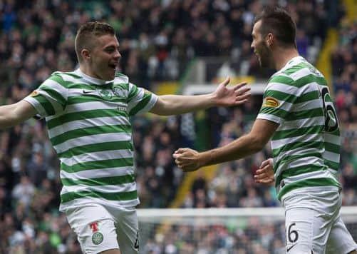 Joe Ledley and James Forrest celebrate Celtic's opener. Picture: SNS
