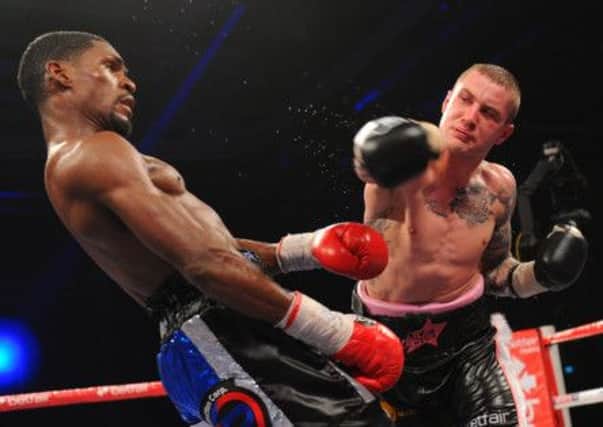 Burns attempts to land a right-hander on Gonzalez as the tide begins to turn at the Emirates Arena. Picture: Robert Perry