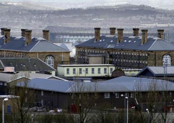 Short-term prisoners should get a vote in the independence referendum say Lib Dems. Pictured is Glasgow's Barlinnie prison. Picture: PA