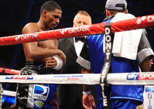 Gonzalez nurses an injured wrist before retiring. Picture: Robert Perry