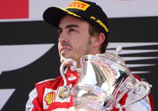 Fernando Alonso: First past the post in Barcelona. Picture: AP