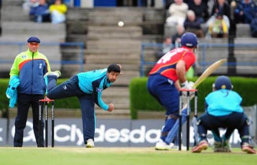 Majid Haq, who finished with two wickets for 22 runs, bowls to Mark Pettini of Essex.   Picture: Ian Rutherford