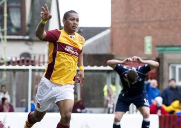 Motherwell star Chris Humphrey celebrates after doubling his side's lead. Picture: SNS