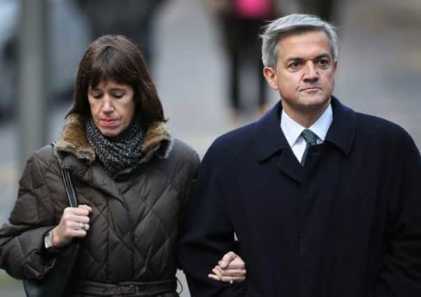 Chris Huhne arrives at Southwark Crown Court with Carina Trimingham in February. Picture: Getty