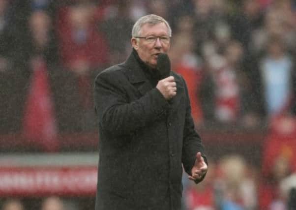 Manchester United's manager Sir Alex Ferguson speaks to the crowd after his last home game in charge of the club. Picture: AP