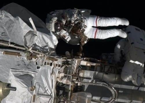 This May 11, 2013 NASA handout image captured by Canadian astronaut Chris Hadfield on board the International Space Staion(ISS) shows astronauts Tom Marshburn and Chris Cassidy during a spacewalk to make repairs. The astronauts repaired an ammonia leak which was discovered May 9. NASA emphasised that the lives of the multinational crew were not in danger but both Russian and US space experts were scrambling to swiftly fix the problem. NASA said the leak of ammonia, which is used to cool the station's power system, was coming from the same general area as in a previous episode in November 2012.  AFP PHOTO/HANDOUT/ NASA /  Chris Hadfield = RESTRICTED TO EDITORIAL USE - MANDATORY CREDIT " AFP PHOTO / NASA / Cmdr.Chris Hadfield " - NO MARKETING NO ADVERTISING CAMPAIGNS - DISTRIBUTED AS A SERVICE TO CLIENTS =Chris Hadfield/AFP/Getty Images
