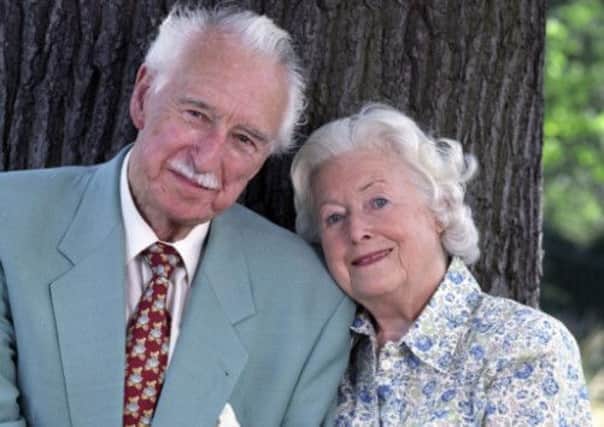 Arnold Peters with June Spencer, who plays his wife, Peggy, in the radio soap. Picture: PA