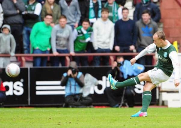 Leigh Griffiths scores from a free kick against Hearts on Sunday.  Picture:  Ian Rutherford