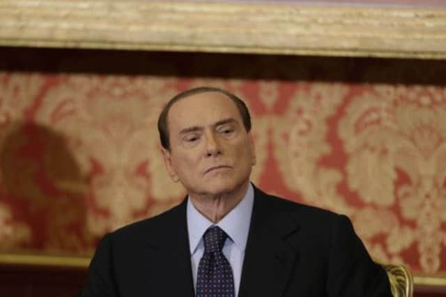 Silvio Berlusconi is also dealing with a sentence for tax fraud. Picture: AP