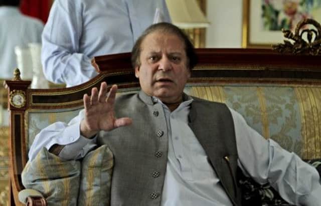 Nawaz Sharif spoke to members of the media yesterday from his home in Lahore. Picture: AP