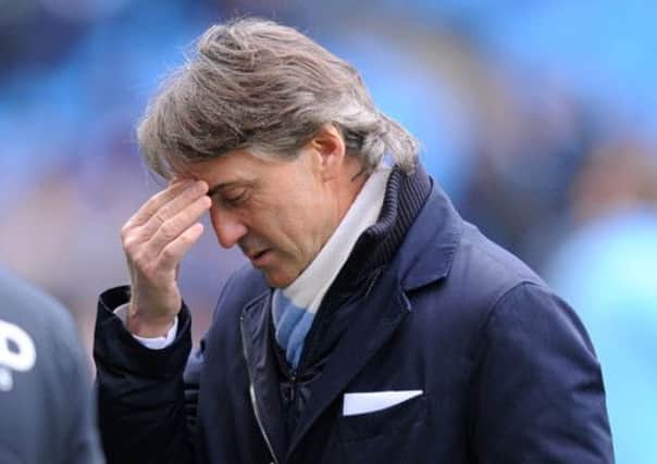 Mancini has been sacked for failure to meet targets. Picture: PA