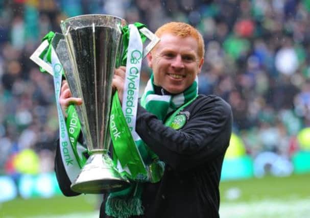 Neil Lennon celebrates Celtic's victory. Picture: Robert Perry