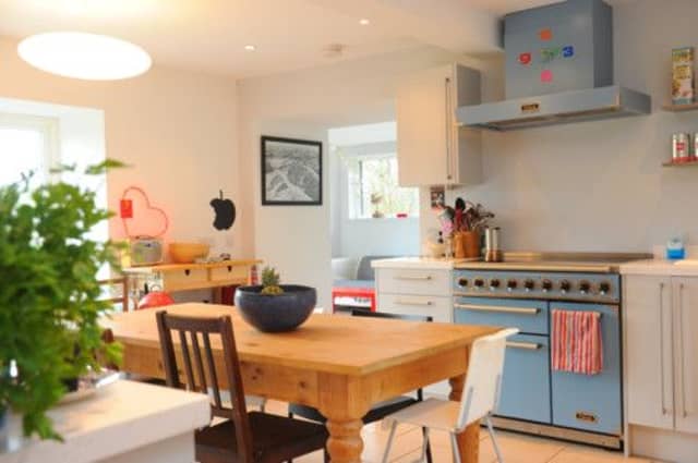 The range cooker was the inspiration for the dining-kitchen. Picture: Robert Perry