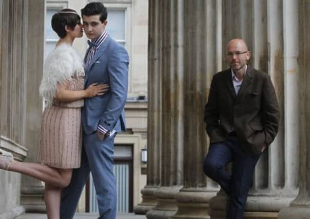 Wayne Hemingway, with models in some of the designs to feature in the Vintage Glasgow festival. Picture: PA