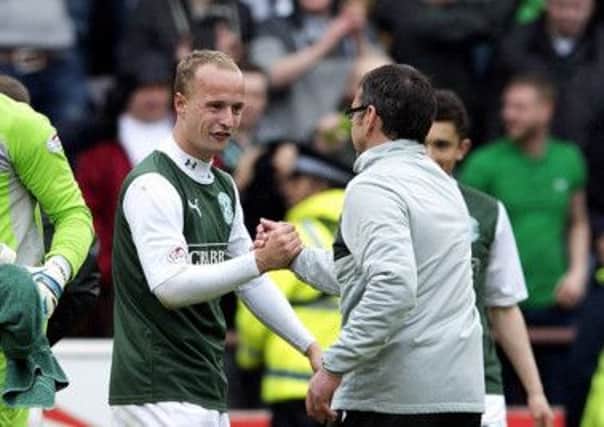 Hibernian's Leigh Griffiths celebrates with manager Pat Fenlon at full-time in last week's derby. Picture: SNS