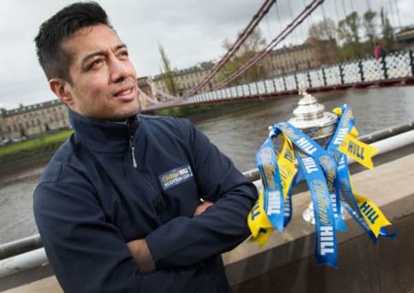 Former Celtic midfielder Bobby Petta with the Scottish Cup trophy. Picture: Contributed