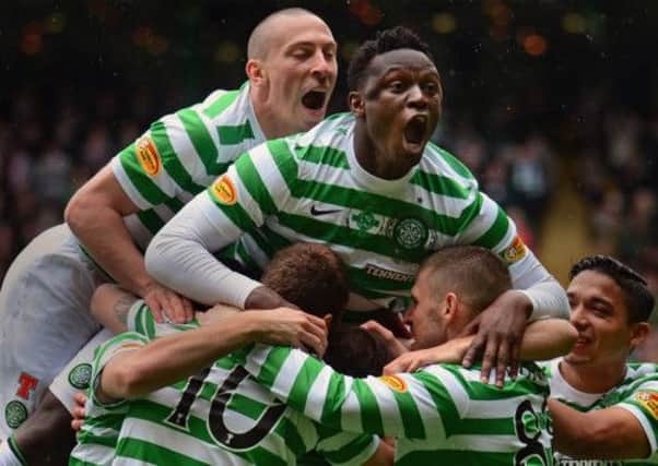 Victor Wanyama celebrates a goal with team-mates. Picture: SNS