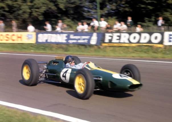 Formula One World Champion Jim Clark driving his Lotus