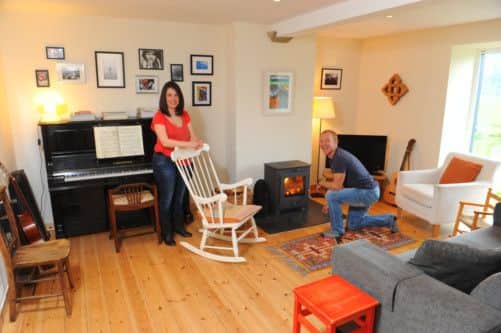 Sophie Pither and Jez Lazell installed a wood-burning stove in the lounge. Picture: Robert Perry