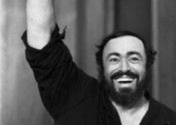 Luciano Pavarotti waves to his fans in Glasgow, where he performed on this day in 1990. Picture: TSPL