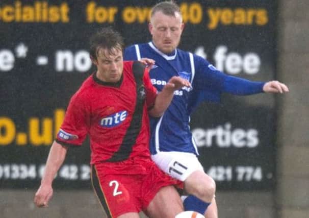 East Fife's Scott Durie battles with Andy Rodgers. Picture: SNS
