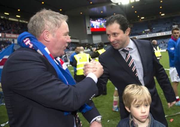 Craig Mather and Ally McCoist celebrate the Third Division title. Picture: SNS