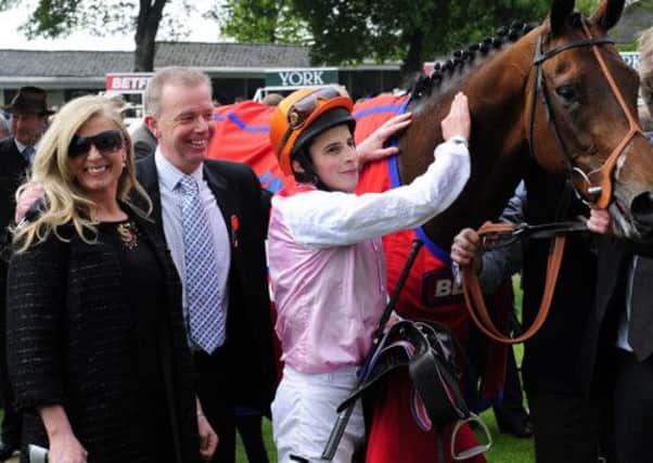 Libertarian and William Buick with trainer Elaine Burke and her husband Karl after their Dante Stakes win at York. Picture: PA